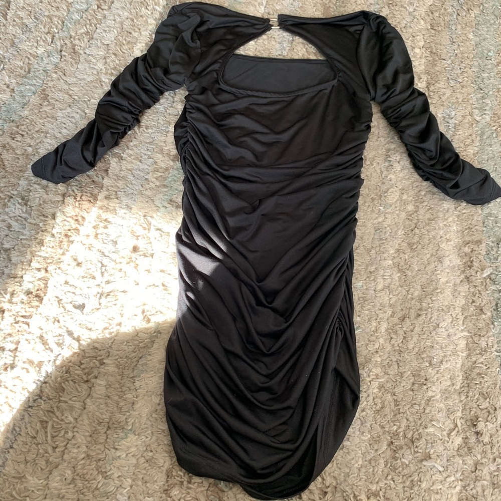 Black dress. Small. Long sleeves. Twenty one.